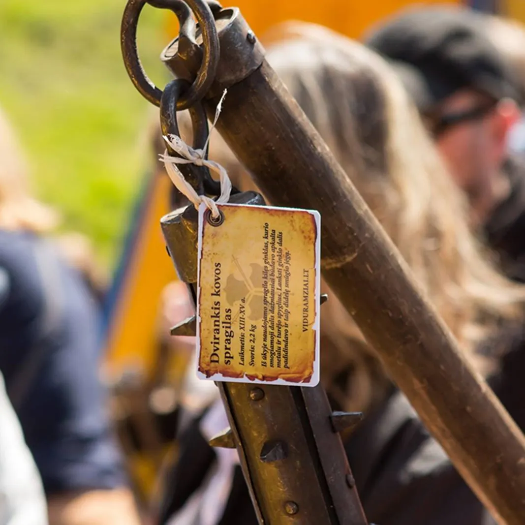 An information tag with historical details attached to a war flail