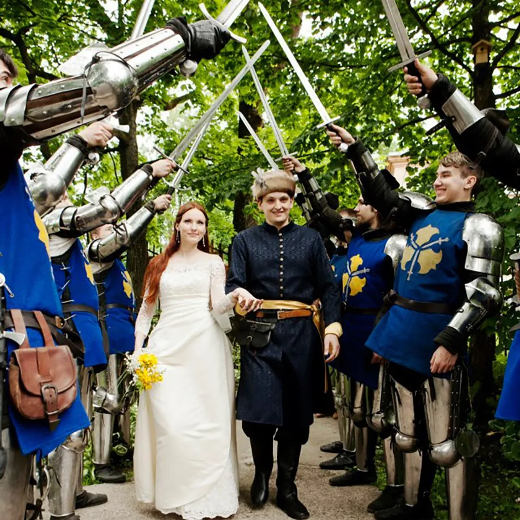 A staged knights' battle scene beside a blazing bonfire