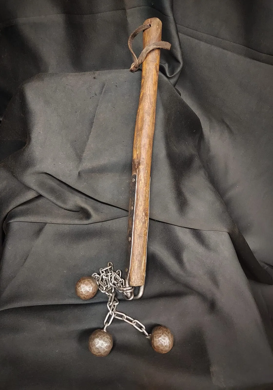 War hammer and chain flail with wooden handles