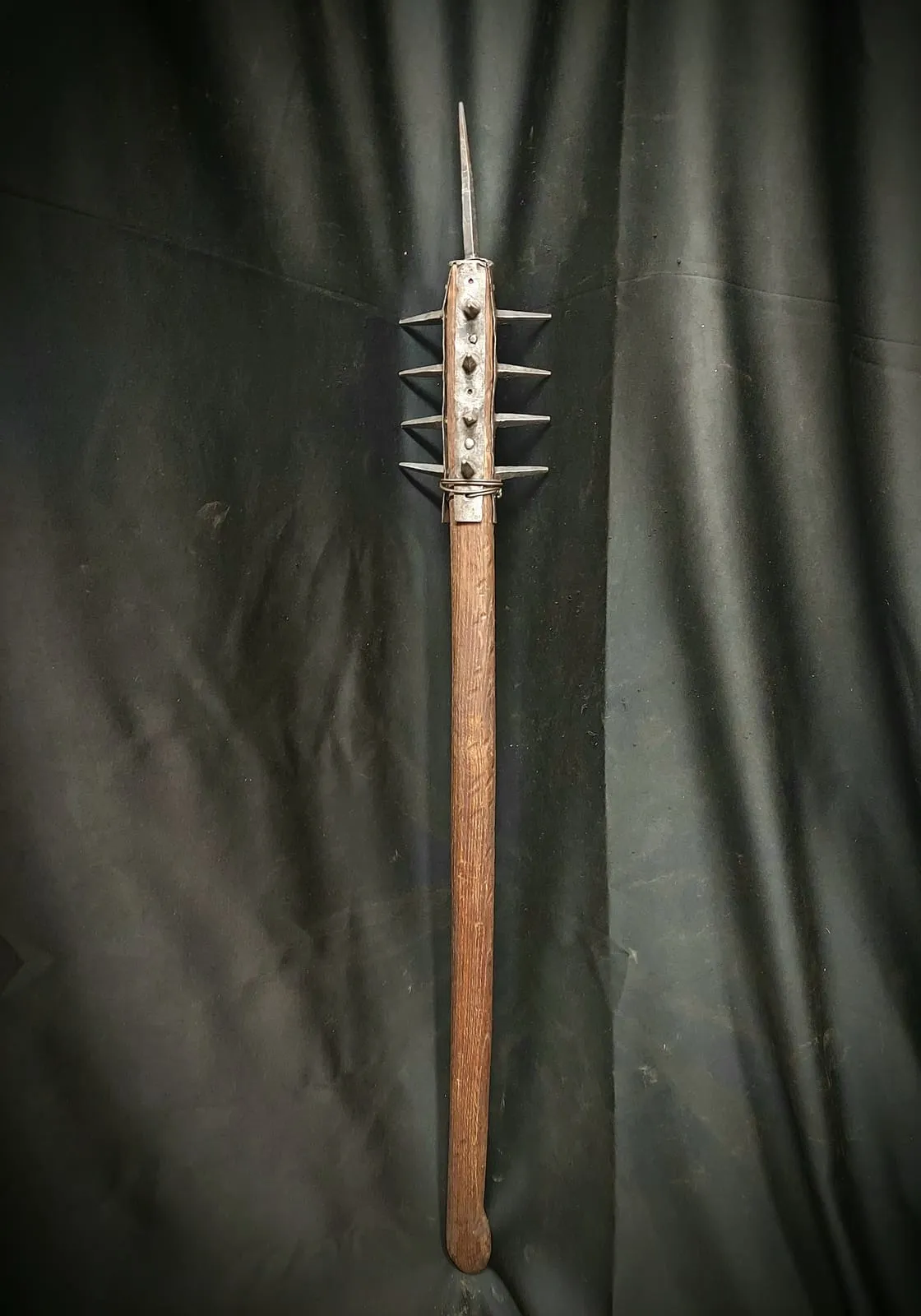 Spiked battle mace on a long wooden shaft