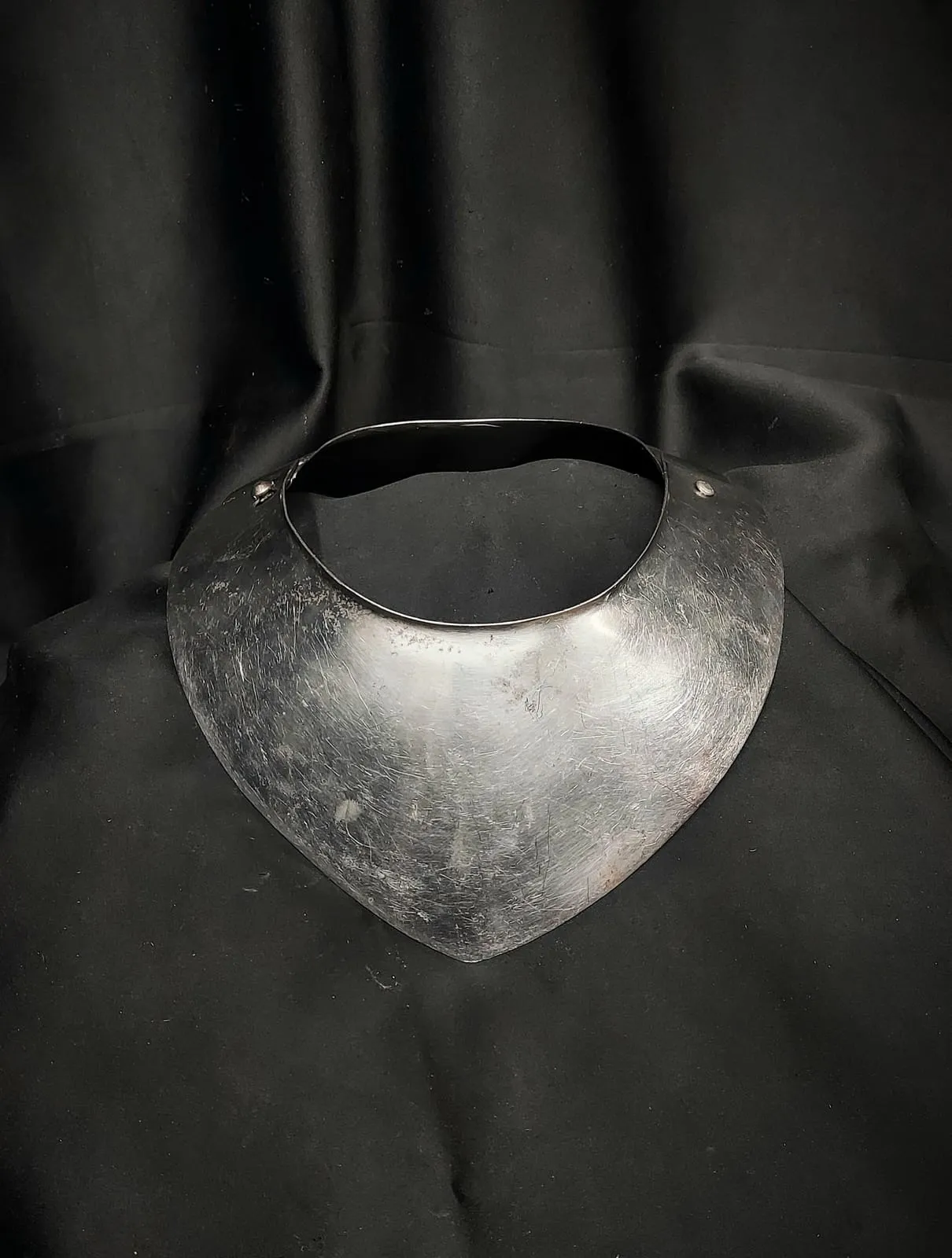 Steel gorget protecting the neck