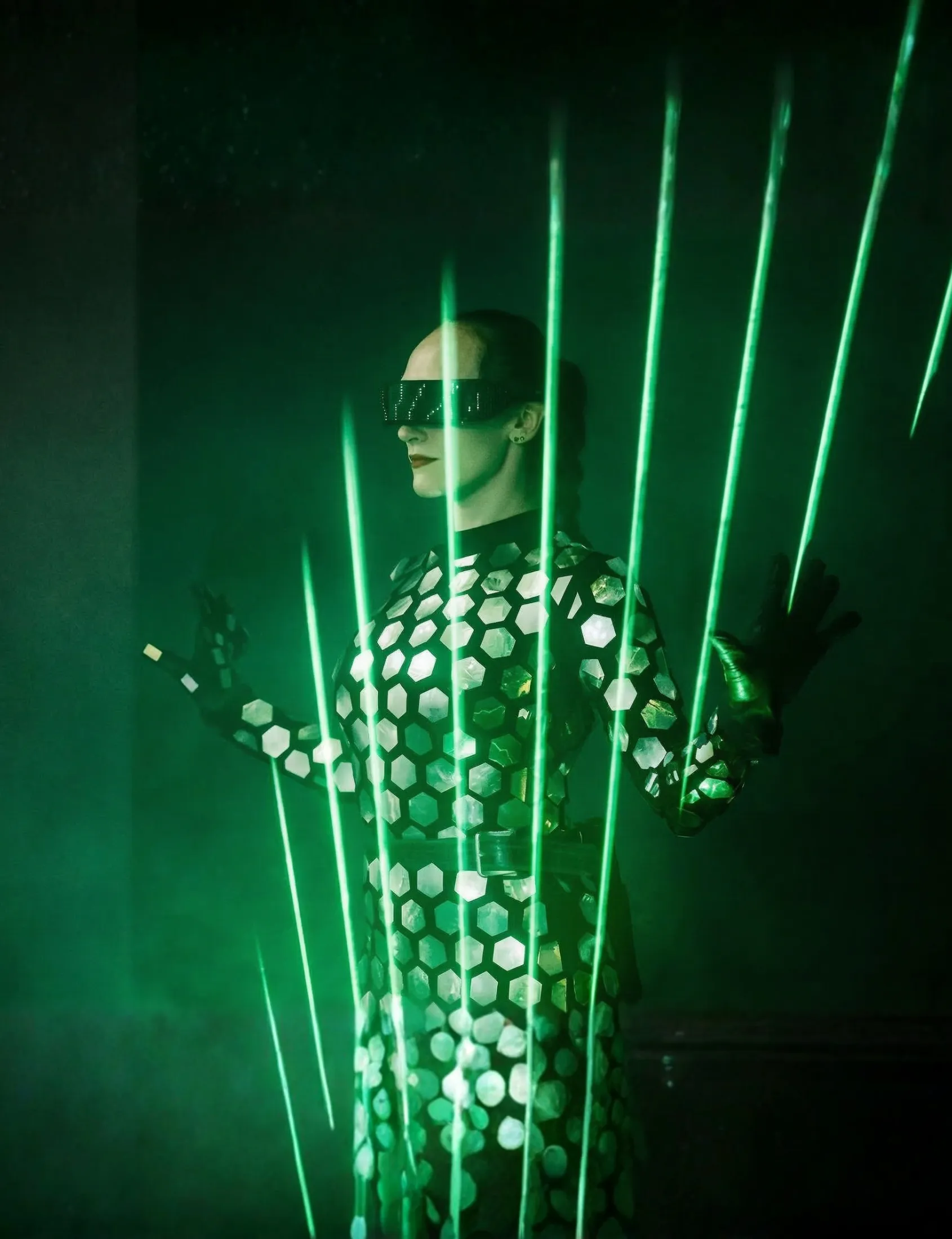 The mysterious Laserman character surrounded by vertical green laser lines