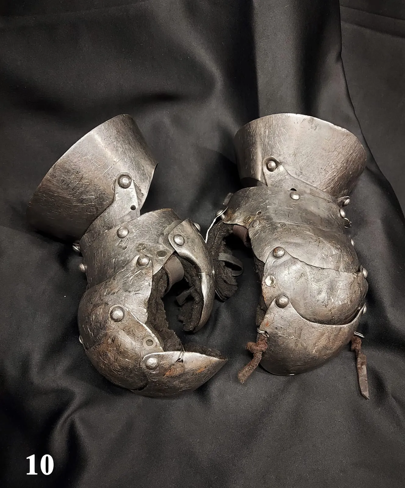 Pair of steel gauntlets with riveted plates