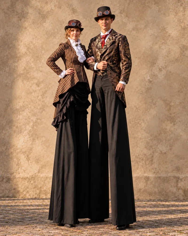 Steampunk kojūkininkai prie sienos